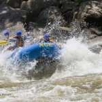 Rafters plow through rapid on New River, ACE Adventure Resort