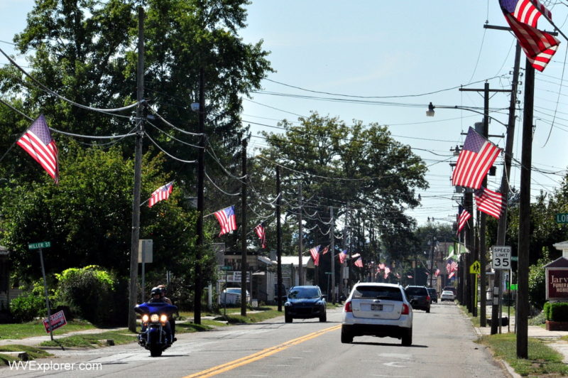 American flags fly along Fourth Steet in Paden City, West Virginia