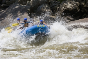 Rafters plow through rapid on New River, ACE Adventure Resort