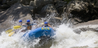 Rafters plow through rapid on New River, ACE Adventure Resort