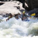 Banking through a New River rapid, ACE Adventure Resort
