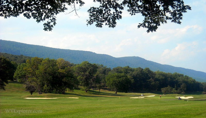 Golfers play Cacapon Resort State Park