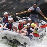 Family rafting through the New River Gorge