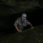 Youth in caving gear near Sinks of Gandy, Randolph County, Caving in Allegheny Highlands Region