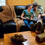 Guests relax in River Expeditions cabin, Fayetteveville, West Virginia, New River Gorge Region