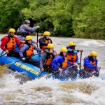 Rafters plunge into a West Virginia rapid