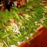 A table full of ramps is ready for cooking.