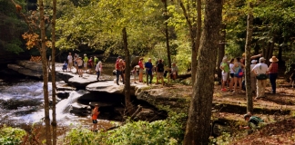 Hikers visit falls at Beckley Mill, Beckley, Raleigh County