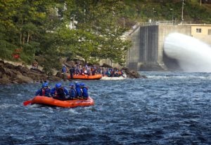 Rafters with Adventures of the Gorge, one of the region's many whitewater guide companies, launch on the Gauley River below Summersville Dam. (Photo courtesy Adventures on the Gorge)