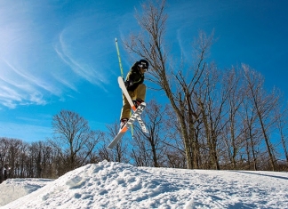 A skier at Canaan Valley Resort is captured in mid-jump.