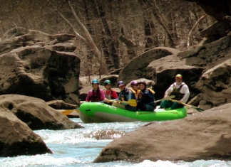 Paddlers explore a once-hidden landscape opening in the New River.