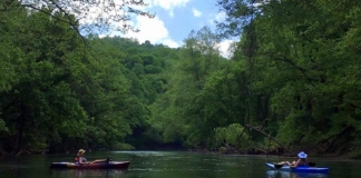 Kayakers float Coal River, expected to fill with more than a thousand kayaks June 16.