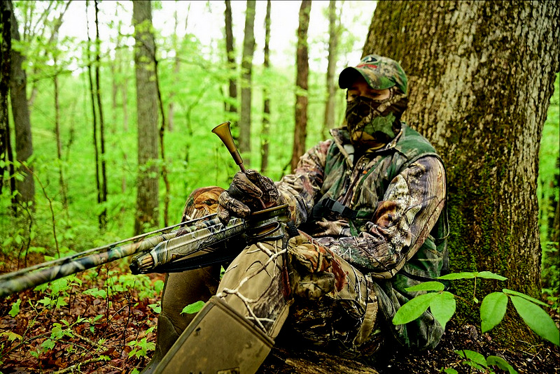 A hunter calls a gobbler during spring turkey season in West Virginia.