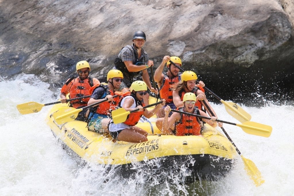 Excited rafters plunge into a rapid on New River.