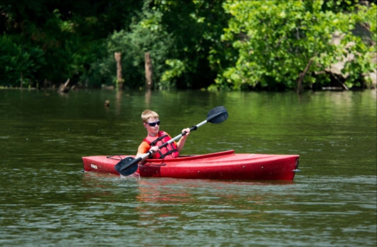 A youth canoes at Beech Fork State Park.