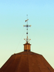 A weathervane mounts the dome of the B&O Roundhouse in Martinsburg, West Virginia.