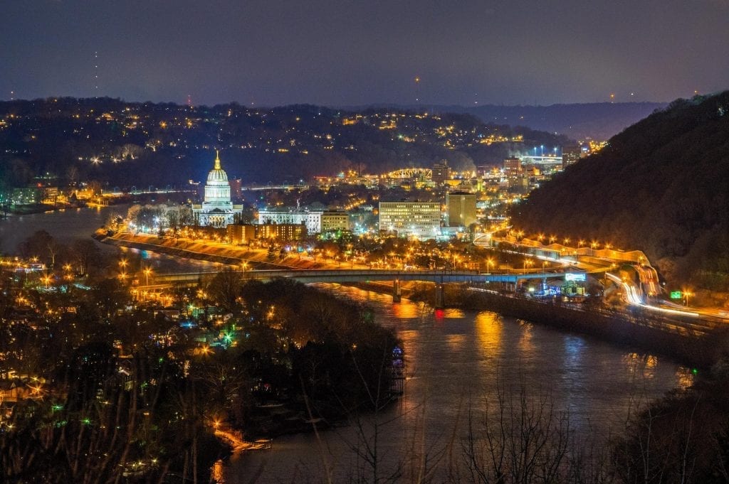 The lights of Charleston shimmer in the Kanawha River.