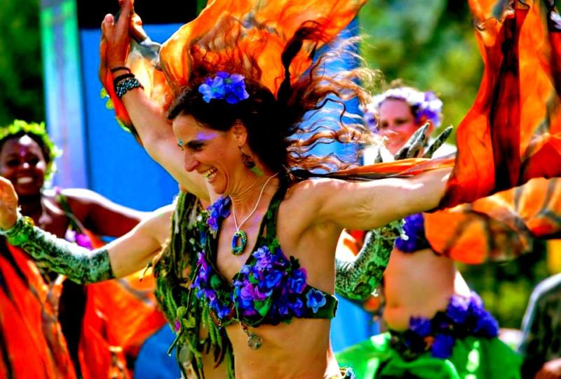A dancer springs through a crowd at Culturefest, celebrated annually near Pipestem, West Virginia.