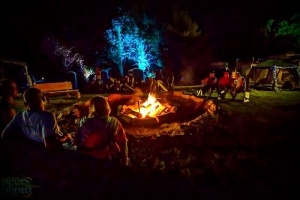 Festival-goers gather around a fire-ring at Culturefest, celebrated annually near Pipestem, West Virginia.
