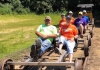 Riders pedal along the old Buffalo Creek & Gauley Railroad, now a rail-trail near Clay, West Virginia.