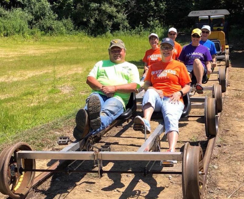 Riders pedal along the old Buffalo Creek & Gauley Railroad, now a rail-trail near Clay, West Virginia.
