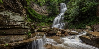 Cathedral Falls drops over sandstone ledges on its descent to the New River near Gauley Bridge, West Virginia.