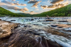 The New River sweeps into the maelstrom above Sandstone Falls, captured by Randall Sanger.