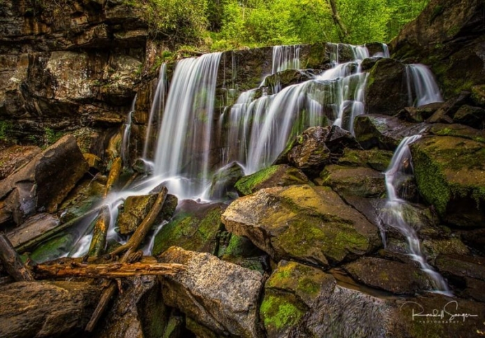 Wolf Creek Falls by Sanger Wolf Creek Falls drops over a ledge in its descent into the New River Gorge near Fayetteville, West Virginia.