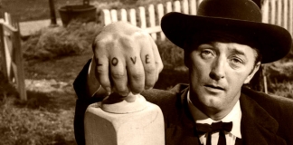 Robert Mitchem displays LOVE-HATE tattoos in "The Night of the Hunter."