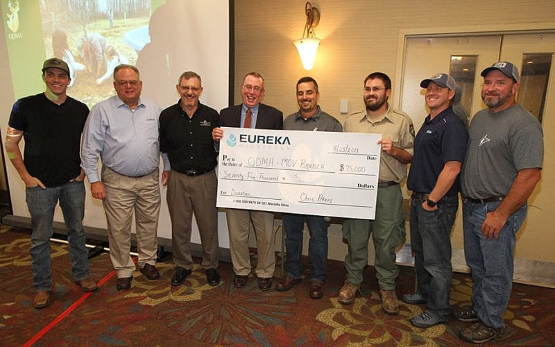 Greg Dotson, director of environmental health and safety for Eureka Midstream, presented the $75,000 to the Mid-Ohio Valley Branch of Quality Deer Management Association at the 2018 Mountaineer QDMA banquet in Morgantown, West Virginia.