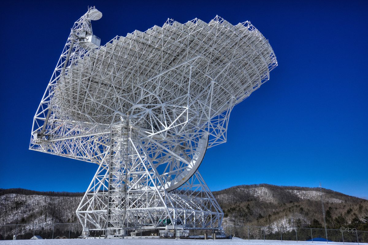 A radio-telescope at Green Bank Observatory looks skyward. Photo by Rick Burgess.