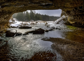 Gandy Creek enters the legendary Sinks-of-Gandy Cave on a frigid morning. Photo courtesy Rick Burgess.