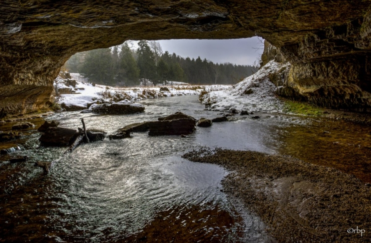 Gandy Creek enters the legendary Sinks-of-Gandy Cave on a frigid morning. Photo courtesy Rick Burgess.