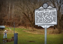 David Sibray explores the capped Copley Oil Well near Weston, West Virginia.