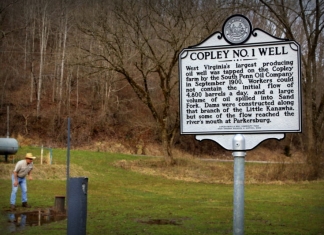 David Sibray explores the capped Copley Oil Well near Weston, West Virginia.