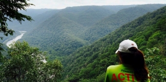 Malorie Polster contemplates the New River from an overlook at Grandview. Photo courtesy Active Southern West Virginia.