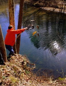Derrick Nutter stocks trout along route of Buffalo Creek and Gauley Railroad.