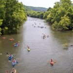 Paddlers float the Elk River below Sutton Dam. Courtesy Braxton County Convention and Visitors Bureau.