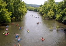 Paddlers float the Elk River below Sutton Dam. Courtesy Braxton County Convention and Visitors Bureau.