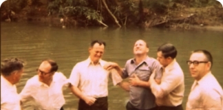 The father of Shirley Stewart Burns is baptized in southern West Virginia.