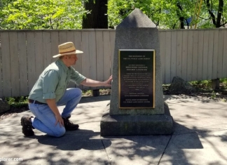David Sibray inspects the Point of Beginning Monument near the West Virginia border.