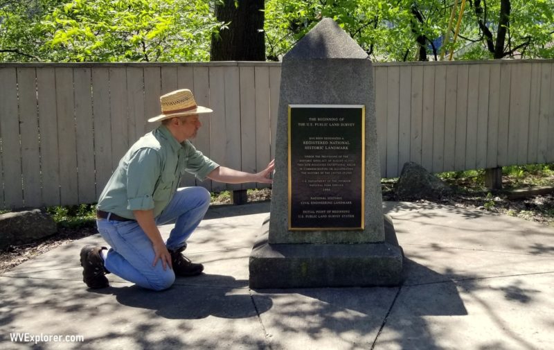 David Sibray inspects the Point of Beginning Monument near the West Virginia border.