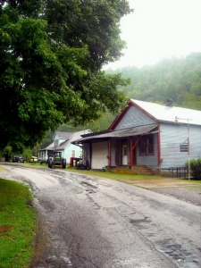 The village of Strange Creek follows a country road into the West Virginia hills.