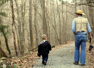 West Virginia Explorer editor David Sibray hikes the Glade Creek Trail in West Virginia with a young friend.