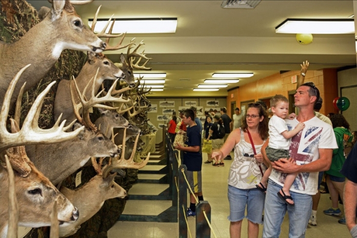 Trophy wall at Hunting and Fishing Day The Big Buck display attracts visitors during the annual West Virginia celebration of National Hunting and Fishing Day.