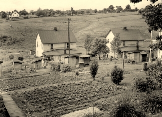 Company houses and backyard gardens climb the hillsides at Grant Town in northern West Virginia.