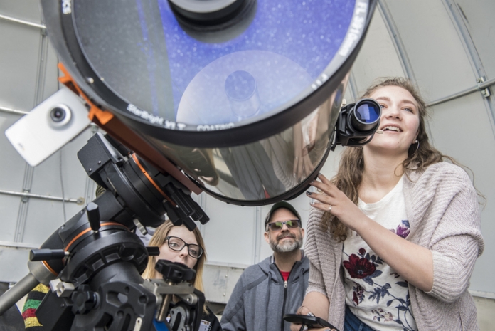 Observatory at West Virginia University Professor Kathryn Williamson and students use the 14-inch telescope at White Hall.