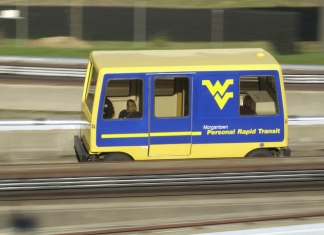 Students ride the PRT at West Virginia University between the Downtown and Evansdale campuses at Morgantown, West Virginia.