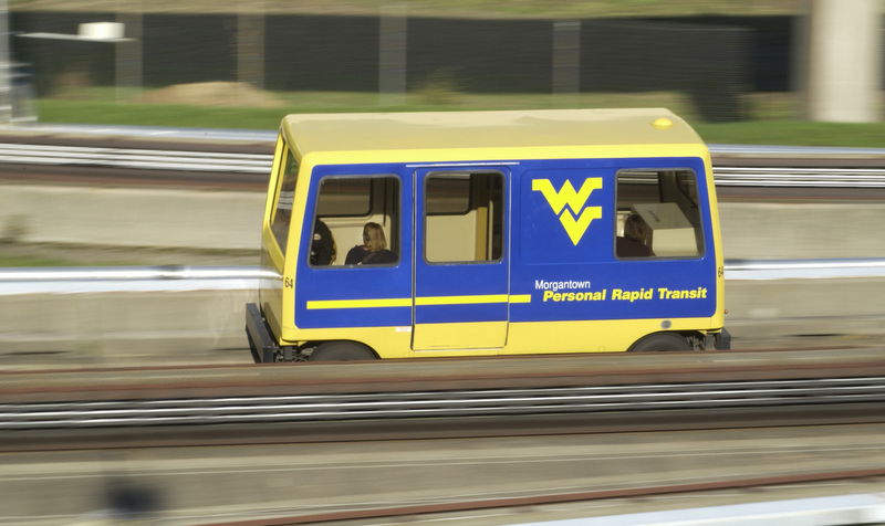 Students ride the PRT at West Virginia University between the Downtown and Evansdale campuses at Morgantown, West Virginia.