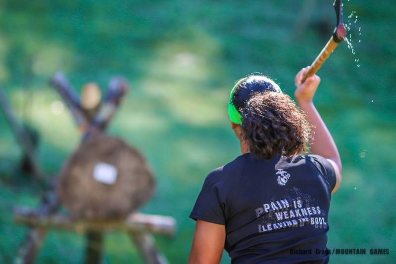 A competitor throws a tomahawk during the annual Mountain Games competition at Heritage Farms near Huntington, West Virginia.